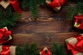 Christmas background with decorations and gift boxes on wooden table. Top view. Copy space.  Merry christmas and happy new year Royalty Free Stock Photo