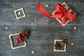 Christmas background with decorative composition of wooden frame, pine cone and snowflakes on wooden board. Happy new year. Card.