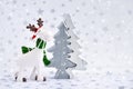 Christmas background with decorative moose and Christmas tree