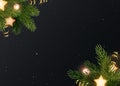 Christmas background design with fir branches, glowing stars, gold serpentines and luminous light bulbs. Dark gray Royalty Free Stock Photo