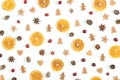 Christmas background. Dried orange slices, fresh cranberries, anise and gingerbreads on white background.