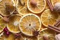 Christmas background of dried oranges, anise, cinnamon and nuts Royalty Free Stock Photo