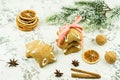 Christmas background with dry oranges, christmas cookies, cinnamon sticks and anise stars. Festive greeting card for winter Royalty Free Stock Photo