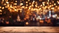 Christmas background with empty dark wooden deck table , blurred light bokeh. Empty display for product montage Royalty Free Stock Photo