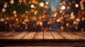 Christmas background with empty dark wooden deck table , blurred light bokeh. Empty display for product montage Royalty Free Stock Photo