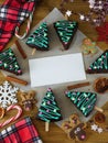 Christmas background with an empty piece of paper in the middle Royalty Free Stock Photo