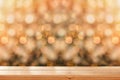 Christmas background. Empty wooden table on a background of golden christmas bokeh.Ready for product montage. Banner Royalty Free Stock Photo