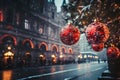 Christmas background with a fir branch with Christmas decorations and a panorama of the festive city in the background