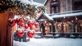 Christmas background with a fir branch with Christmas decorations and a panorama of the festive city in the background