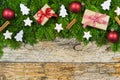 Christmas background with fir branches border, presents and traditional decor Royalty Free Stock Photo