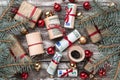 Christmas background, fir branches, gifts, baubles, money of different values. Top view Royalty Free Stock Photo