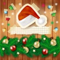 Christmas background with fir, Santa`s hat and copy space Royalty Free Stock Photo