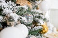 Christmas background. fir tree branch with cones and ornament. Christmas baubles in golden and white colours. Winter Royalty Free Stock Photo