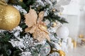 Christmas background. fir tree branch with cones and ornament. Christmas baubles in golden and white colours. Winter Royalty Free Stock Photo