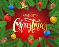 Christmas background with fir tree branches, pine cone, bell, bow and red, blue, yellow balls with decorations. Royalty Free Stock Photo