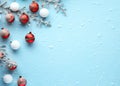 Christmas background with fir tree branches and snowflakes on blue background Royalty Free Stock Photo