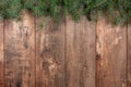 Christmas background with fir tree. Christmas tree branches on wooden texture ready for your design. Winter holidays background Royalty Free Stock Photo
