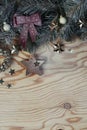 Christmas background with fir tree and decoration on light wooden board vintage image style, portrait Royalty Free Stock Photo