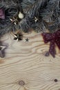 Christmas background with fir tree and decoration on light wooden board vintage image style, portrait Royalty Free Stock Photo