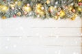 Christmas background with fir tree and decoration on white wooden board Royalty Free Stock Photo