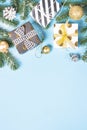 Christmas background - fir tree and decorations on blue top view Royalty Free Stock Photo