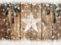 Christmas background with fir tree and snow on wooden board Royalty Free Stock Photo