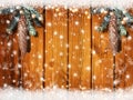 Christmas background with fir tree and snowflakes on wood Royalty Free Stock Photo