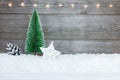 Christmas background with fir tree, star, pine cone and snow on Royalty Free Stock Photo