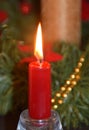 Christmas background with first Advent candle. Royalty Free Stock Photo