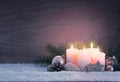 Four pink burning advent candles. Christmas card. Royalty Free Stock Photo