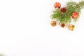 Christmas background, fresh fir tree branches with red baubles and golden gifts isolated on white, new year web banner Royalty Free Stock Photo