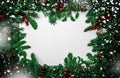Christmas background with frosted fir tree. Snow Christmas composition with frame of fir branches and pine cones. Merry Christmas Royalty Free Stock Photo