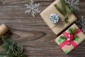 Christmas background with gift box. Christmas gifts in handmade boxes on a wooden table. Top view with copy space. Royalty Free Stock Photo