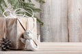 Christmas background with gift box and little angel Royalty Free Stock Photo
