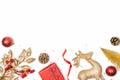 Christmas background - gift box, mistletoe, fircones,reindeer and christmas balls in golden and red colors over white background. Royalty Free Stock Photo