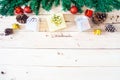 Christmas background with gift and christmas Decoration , christmas tree and pine cones on wooden table. Top view with copy space Royalty Free Stock Photo