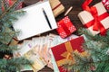 Christmas background. Gifts for loved ones. Planning the holidays. Money of different values. Space for text