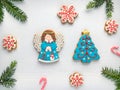 Christmas background with gingerbread cookies and green fir tre Royalty Free Stock Photo