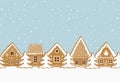 Christmas background. Gingerbread village. Seamless border. gingerbread houses and fir trees on a blue background