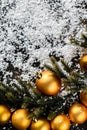 Christmas background. gold baubles a deco on dark black background. copy space. Selective focus Royalty Free Stock Photo