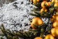 Christmas background. gold baubles a deco on dark black background. copy space. Selective focus Royalty Free Stock Photo