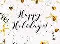 Christmas background with golden balls and `Happy Holidays` text isolated on white Royalty Free Stock Photo