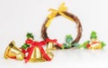 Christmas background, golden bells with red ribbon