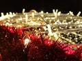 Christmas Background. Golden Holiday Abstract Glitter Defocused Background With Blinking Stars. Blurred Bokeh Royalty Free Stock Photo