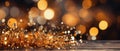 Christmas background with golden tinsel and bokeh lights. Copy space . Royalty Free Stock Photo