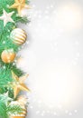 Christmas background with green branches and yellow ornaments Royalty Free Stock Photo