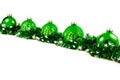 Christmas background with green glossy balls and garland