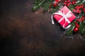 Christmas red present box on dark background. Royalty Free Stock Photo