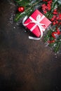 Christmas red present box on dark background. Royalty Free Stock Photo