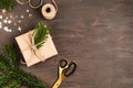 Christmas background with handmade gifts wrapping, presents on rustic wooden table